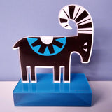 The Ram (Pan, Aries) decorative bookend.  Pan is the Goat foot god!