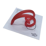 a pair of Fibonacci - Golden Ratio Spiral Earings coral color