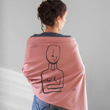 woman wearing female salmon pink cotton stole shawl scarf modern cycladic idol in a studio