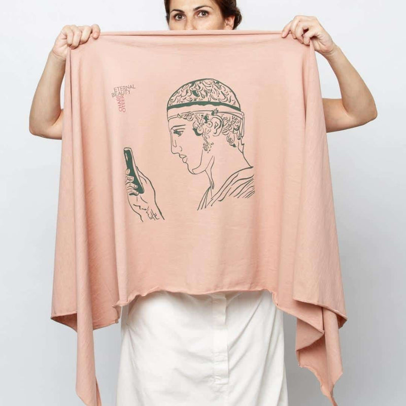 Charioteer statue depicted in a modern Greek shawl - pink color