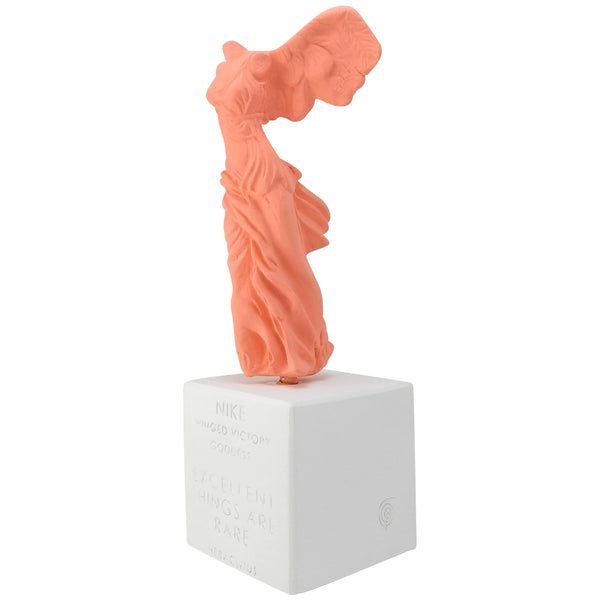 Nike of Samothrace statue replica in coral color with quote excellent things are rare (angle view)